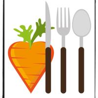 Image of a heart shaped carrot next to a knife, fork, and spoon