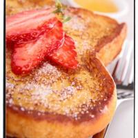 French Toast with butter and berries