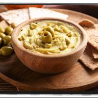 Olive Hummus on Flatbread Crackers